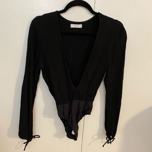 Flynn Skye Deep Cut Black Bodysuit - Size XS/S
